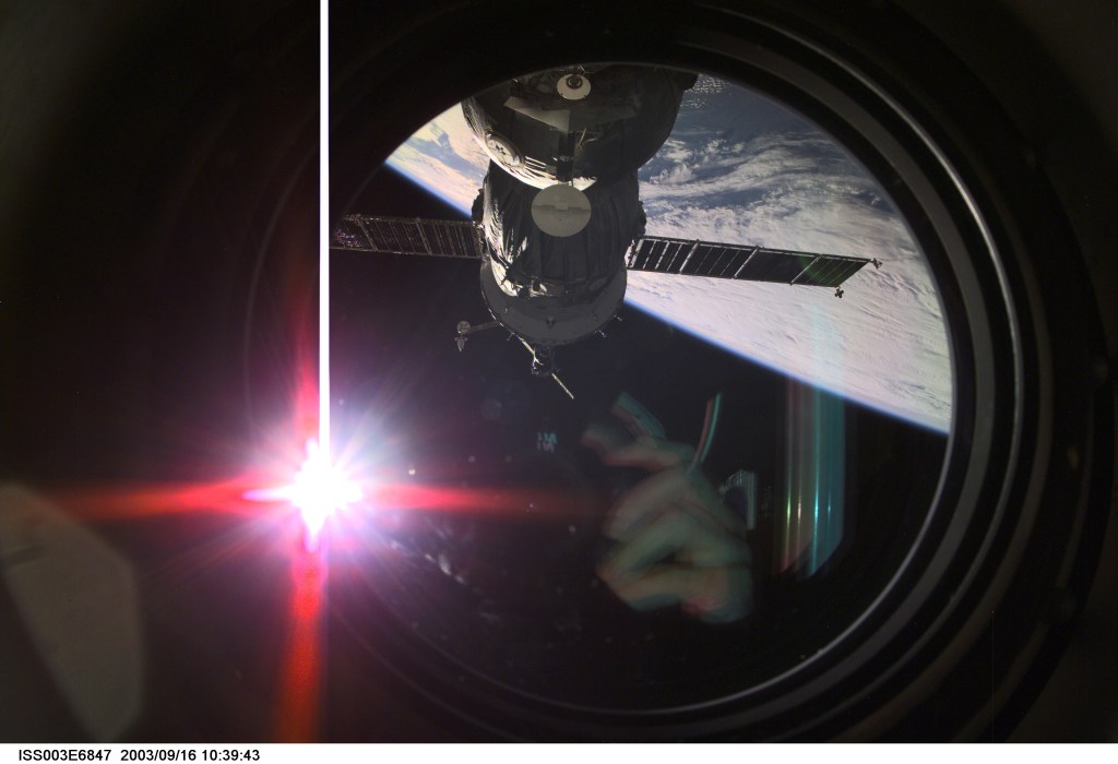 A Soyuz spacecraft approaches the International Space Station (ISS) carrying the Soyuz taxi crew, Commander Victor Afanasyev, Flight Engineer Konstantin Kozeev and French Flight Engineer Claudie Haignere for an eight-day stay on the station. Afanasyev and Kozeev represent Rosaviakosmos, and Haignere represents ESA, carrying out a flight program for CNES, the French Space Agency, under a commercial contract with the Russian Aviation and Space Agency. This image was taken with a digital still camera.