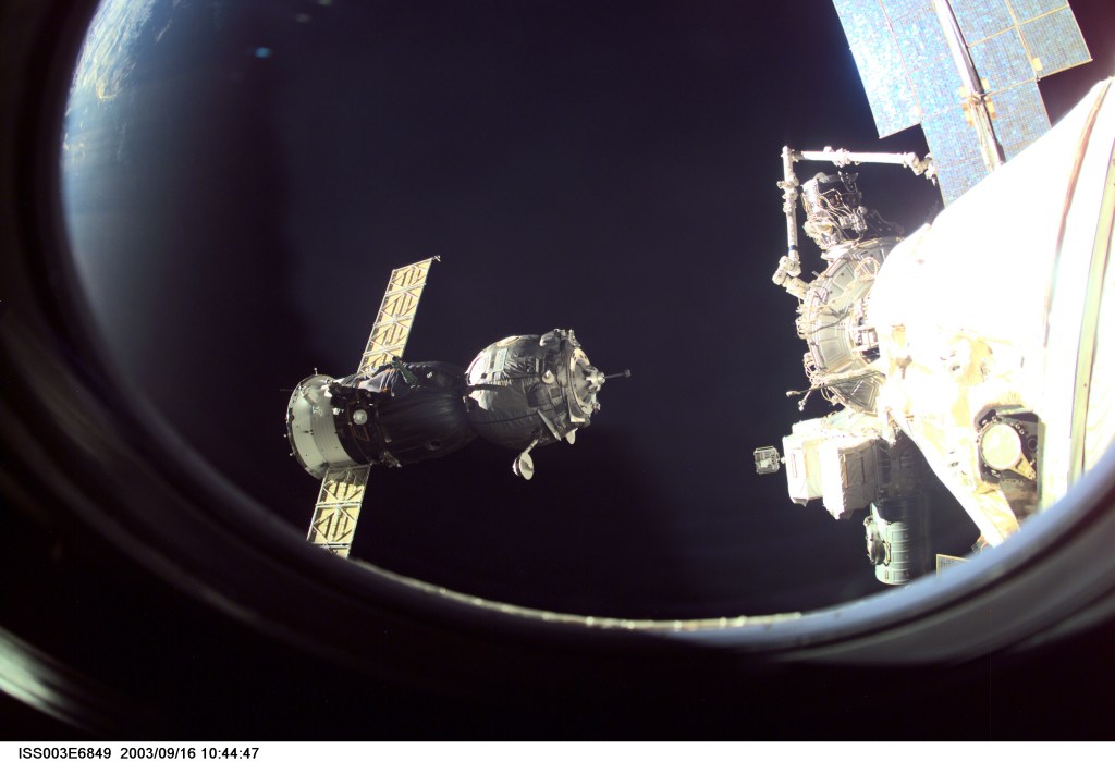 A Soyuz spacecraft approaches the International Space Station (ISS) carrying the Soyuz taxi crew, Commander Victor Afanasyev, Flight Engineer Konstantin Kozeev and French Flight Engineer Claudie Haignere for an eight-day stay on the station. Afanasyev and Kozeev represent Rosaviakosmos, and Haignere represents ESA, carrying out a flight program for CNES, the French Space Agency, under a commercial contract with the Russian Aviation and Space Agency. This image was taken with a digital still camera.