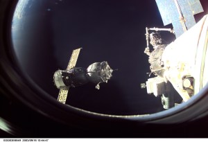 A Soyuz spacecraft approaches the International Space Station (ISS) carrying the Soyuz taxi crew, Commander Victor Afanasyev, Flight Engineer Konstantin Kozeev and French Flight Engineer Claudie Haignere for an eight-day stay on the station. Afanasyev and Kozeev represent Rosaviakosmos, and Haignere represents ESA, carrying out a flight program for CNES, the French Space Agency, under a commercial contract with the Russian Aviation and Space Agency. This image was taken with a digital still camera.