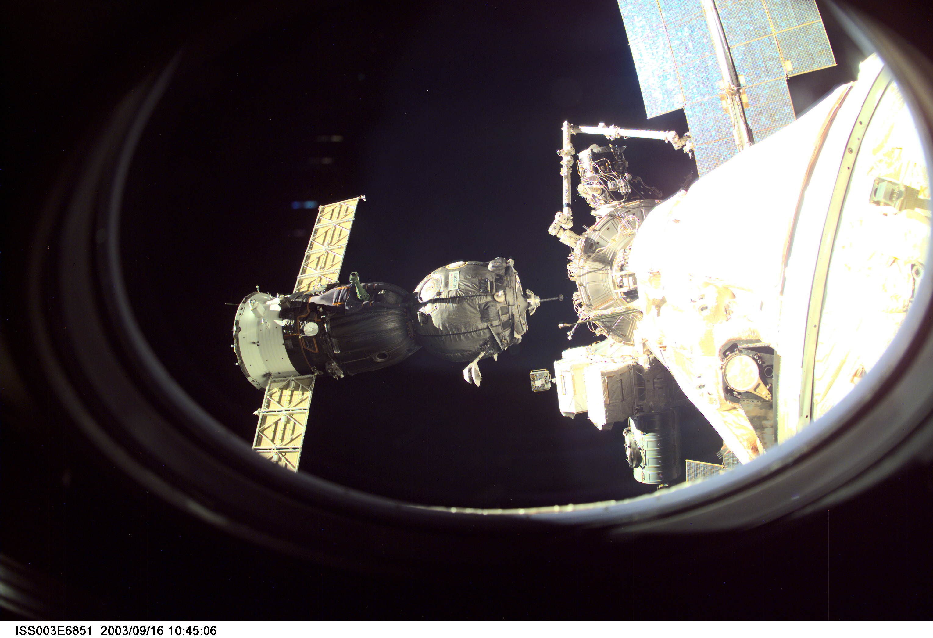 A Soyuz spacecraft approaches the International Space Station (ISS) carrying the Soyuz taxi crew, Commander Victor Afanasyev, Flight Engineer Konstantin Kozeev and French Flight Engineer Claudie Haignere for an eight-day stay on the station. Afanasyev and Kozeev represent Rosaviakosmos, and Haignere represents ESA, carrying out a flight program for CNES, the French Space Agency, under a commercial contract with the Russian Aviation and Space Agency. This image was taken with a digital still camera.