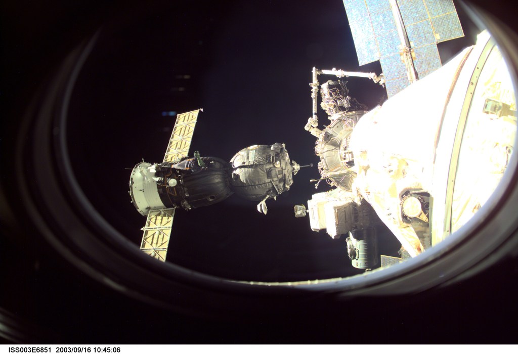 A Soyuz spacecraft approaches the International Space Station (ISS) carrying the Soyuz taxi crew, Commander Victor Afanasyev, Flight Engineer Konstantin Kozeev and French Flight Engineer Claudie Haignere for an eight-day stay on the station. Afanasyev and Kozeev represent Rosaviakosmos, and Haignere represents ESA, carrying out a flight program for CNES, the French Space Agency, under a commercial contract with the Russian Aviation and Space Agency. This image was taken with a digital still camera.