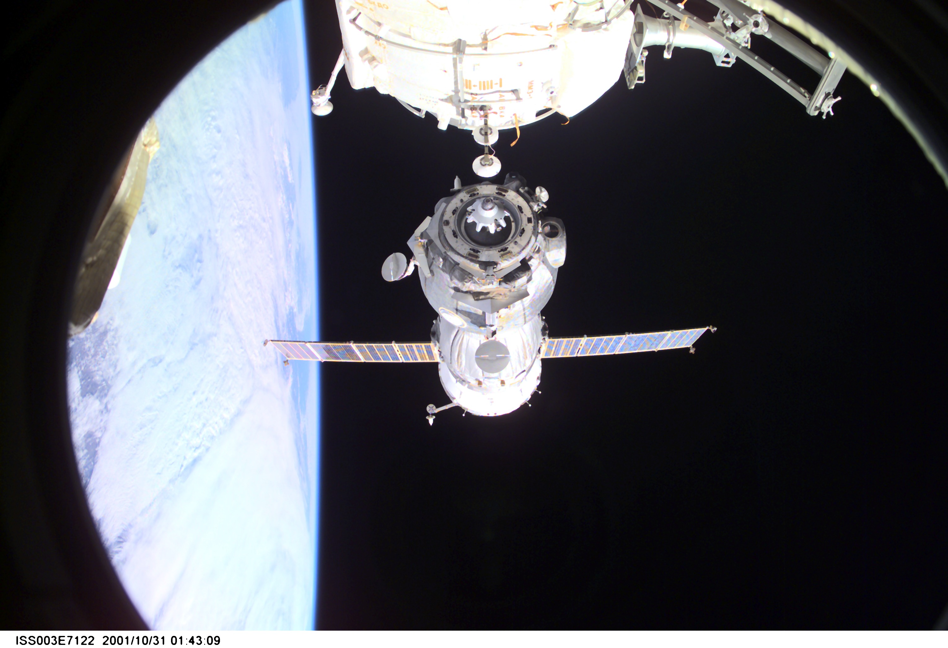 Backdropped by Earth’s horizon and the blackness of space, a Soyuz spacecraft undocks from the International Space Station (ISS) carrying the Soyuz taxi crew, Commander Victor Afanasyev, Flight Engineer Konstantin Kozeev and French Flight Engineer Claudie Haignere, ending their eight-day stay on the station. Afanasyev and Kozeev represent Rosaviakosmos, and Haignere represents ESA, carrying out a flight program for CNES, the French Space Agency, under a commercial contract with the Russian Aviation and Space Agency. This image was taken with a digital still camera.