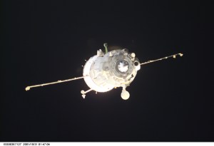 Backdropped by the blackness of space, a Soyuz spacecraft departs from the International Space Station (ISS) carrying the Soyuz taxi crew, Commander Victor Afanasyev, Flight Engineer Konstantin Kozeev and French Flight Engineer Claudie Haignere, ending their eight-day stay on the station. Afanasyev and Kozeev represent Rosaviakosmos, and Haignere represents ESA, carrying out a flight program for CNES, the French Space Agency, under a commercial contract with the Russian Aviation and Space Agency. This image was taken with a digital still camera.