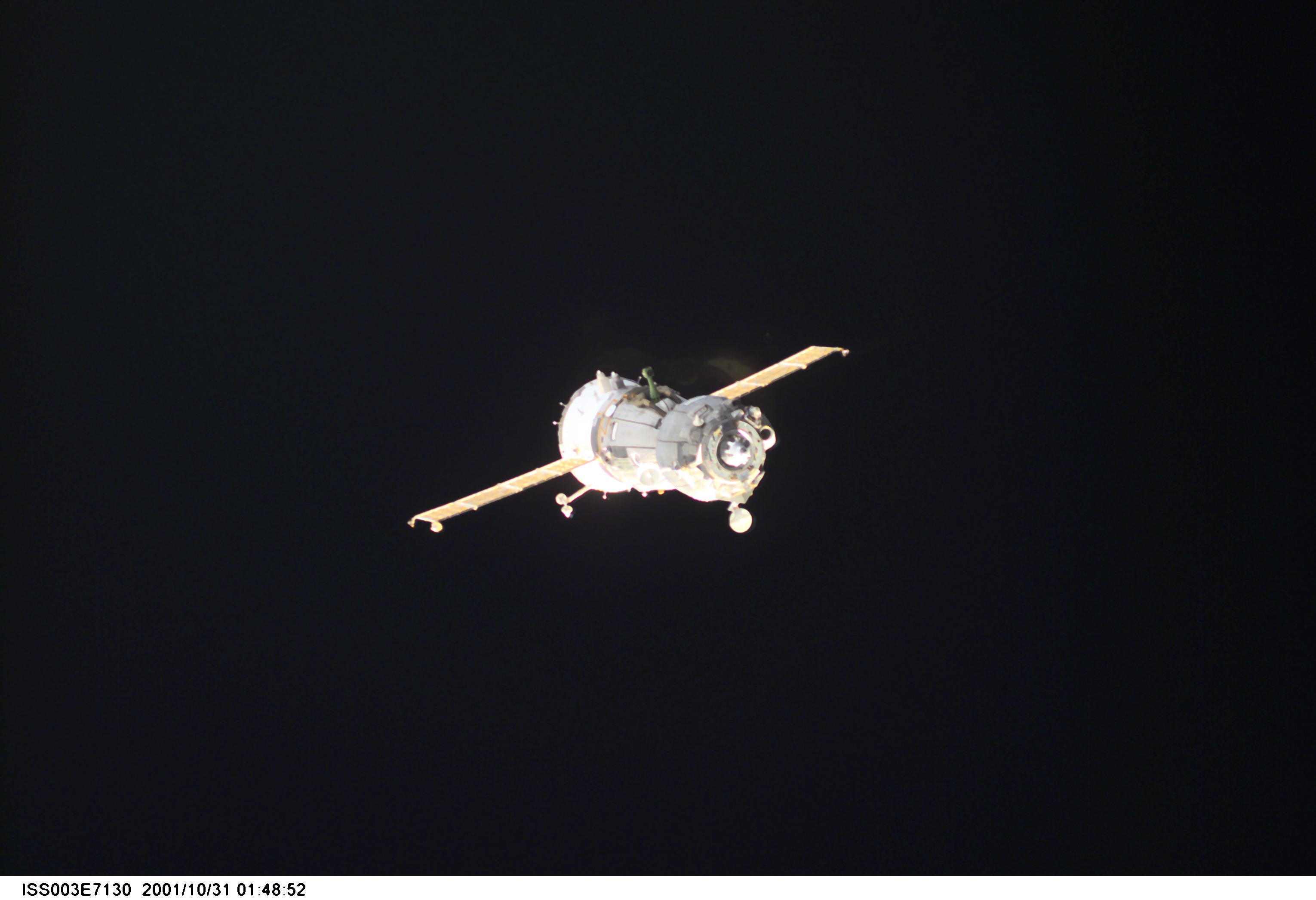 A Soyuz spacecraft departs from the International Space Station (ISS) carrying the Soyuz taxi crew, Commander Victor Afanasyev, Flight Engineer Konstantin Kozeev and French Flight Engineer Claudie Haignere, ending their eight-day stay on the station. Afanasyev and Kozeev represent Rosaviakosmos, and Haignere represents ESA, carrying out a flight program for CNES, the French Space Agency, under a commercial contract with the Russian Aviation and Space Agency. This image was taken with a digital still camera.