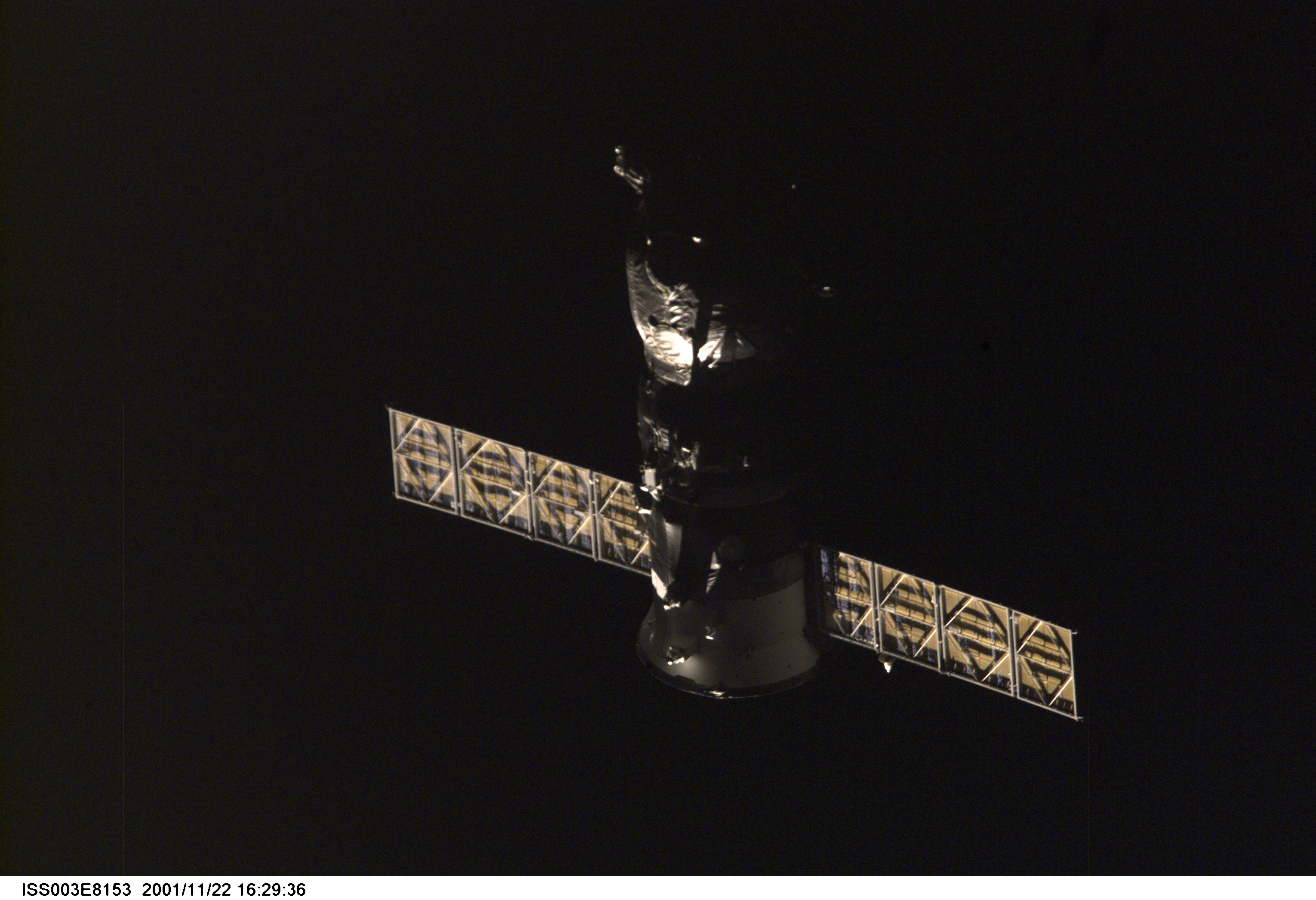 Backdropped by the blackness of space, an unpiloted Progress supply vehicle departs from the Zvezda Service Module’s docking port on the International Space Station (ISS) carrying its load of trash and unneeded equipment to be deorbited and burned up in the atmosphere. Its undocking makes room for Progress 6, scheduled for launch from the Baikonur Cosmodrome in Kazakhstan at 12:24 p.m. (CST) on Monday, November 26, 2001. The new Progress, filled with fresh supplies, is planned to dock to the station at 1:45 p.m. (CST) on Wednesday, November 28, 2001. This image was taken with a digital still camera.