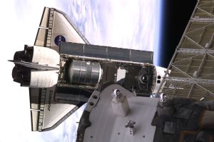 Backdropped against Earth's horizon, the Space Shuttle Endeavour, controlled by the flight crew of STS-108, rapidly approaches the International Space Station (ISS). Among other activities Endeavour's mission will include the change out of the station crews. The image was recorded with a digital still camera.