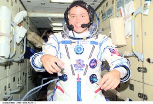 Astronaut Daniel W. Bursch, Expedition Four flight engineer, wearing a Russian Sokol suit, is photographed in the functional cargo block (FGB), or Zarya on the International Space Station (ISS). The image was taken with a digital still camera.