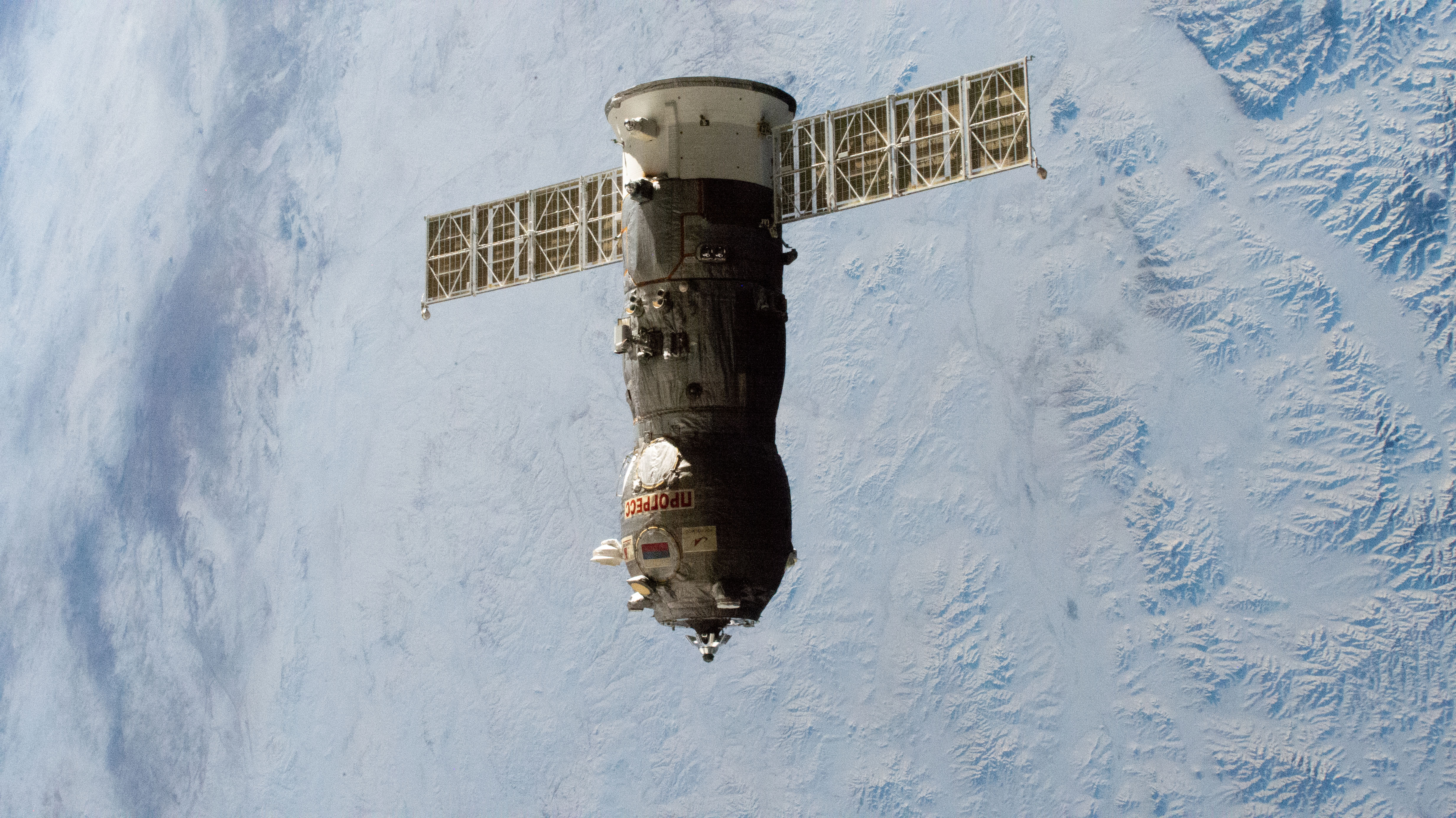 The trash-packed Roscosmos Progress 84 cargo craft departs the International Space Station as both spacecraft orbited 263 miles above northeast Asia.