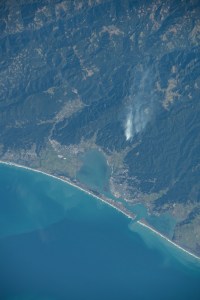 Wildfires in northern California's Humboldt County off the coast of the Pacific Ocean are pictured from the International Space Station as it orbited 261 miles above.