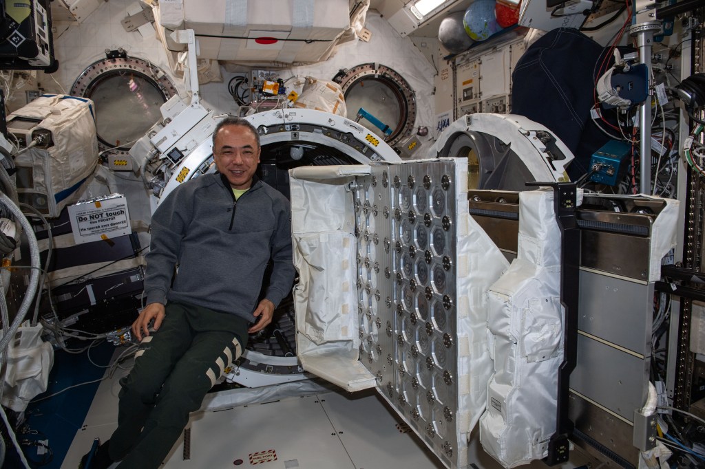 JAXA (Japan Aerospace Exploration Agency) astronaut and Expedition 70 Flight Engineer Satoshi Furukawa installs a multipurpose experiment platform for placement inside the Kibo laboratory module's airlock.
