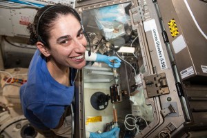 NASA astronaut and Expedition 70 Flight Engineer Jasmin Moghbeli processes liver stem cell samples inside the Kibo laboratory module’s Life Science Glovebox for the Space AGE investigation. The experiment is researching space-caused aging symptoms like those seen in the elderly on Earth and observes how aged immune cells affect liver regeneration providing deeper insights into the biology of aging and its effects on disease mechanisms.