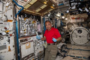 JAXA (Japan Aerospace Exploration Agency) astronaut Satoshi Furukawa is pictured while completing maintenance on the Multi Purpose Small Payload Rack (MSPR) in the Japanese Experiment Module. MSPR offers a workspace for orbital crew members to conduct scientific research in microgravity.