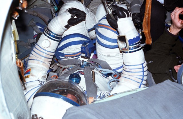 Astronaut Frank L. Culbertson, Jr., attired in a training version of the Sokol cosmonaut suit, participates in a training session in a full-size Soyuz trainer at the Gagarin Cosmonaut Training Center in Russia. Culbertson is in training as commander of the Expedition Three mission. He was named to that position in September of this year.