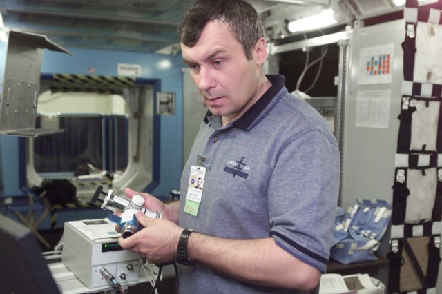 Cosmonaut Vladimir N. Dezhurov, Expedition Three flight engineer representing Rosaviakosmos, participates in Pulmonary Function in Flight (PuFF) nominal operations training in the International Space Station (ISS) Destiny laboratory mockup/trainer at the Johnson Space Center’s Systems Integration Facility.