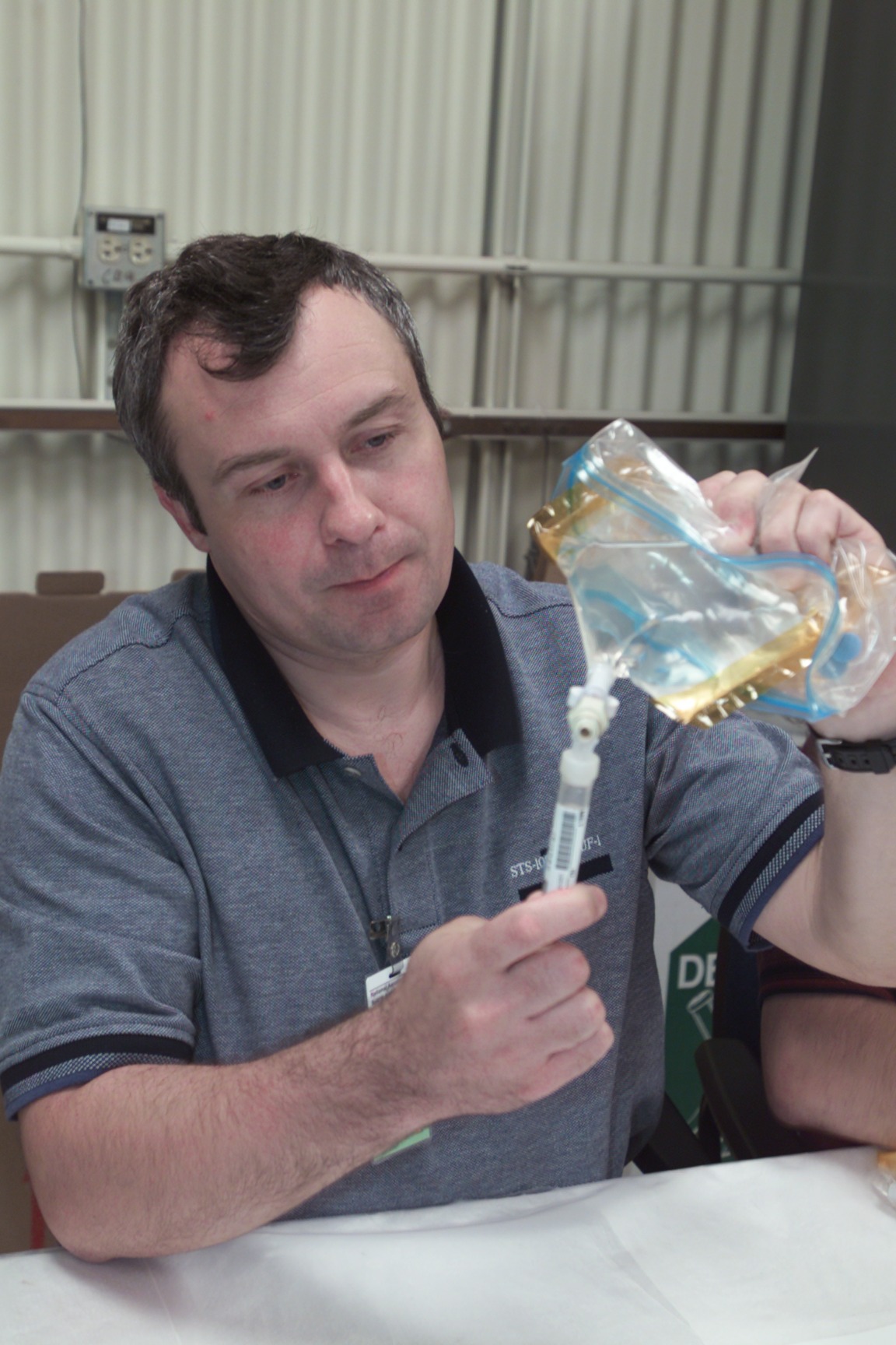 Cosmonaut Vladimir N. Dezhurov, Expedition Three flight engineer, participates in biomedical training in the Bioengineering and Test Support Facility at Johnson Space Center (JSC). Dezhurov is affiliated with Rosaviakosmos.