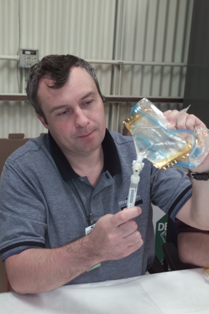 Cosmonaut Vladimir N. Dezhurov, Expedition Three flight engineer, participates in biomedical training in the Bioengineering and Test Support Facility at Johnson Space Center (JSC). Dezhurov is affiliated with Rosaviakosmos.