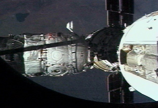 The Russian Docking Compartment, named Pirs (the Russian word for pier), docks with the International Space Station (ISS). One of the Expedition Three crew members, using a video camera, recorded the rendezvous and docking from onboard the orbital outpost. The Pirs vehicle was launched on September 14, 2001, and docking occurred on September 16.