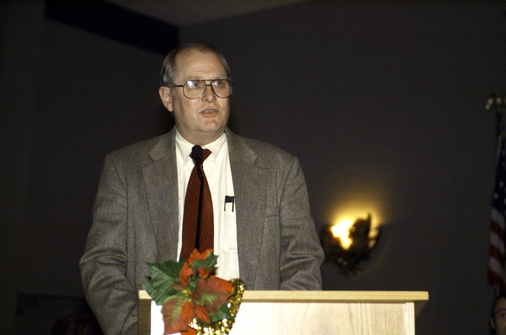 JSC2001-E-45028 (20 December 2001) --- Johnson Space Center’s (JSC) Deputy Director Randy Stone speaks from the lectern in the ballroom of the Gilruth Center at JSC during the Expedition Three Welcome Home ceremony.
