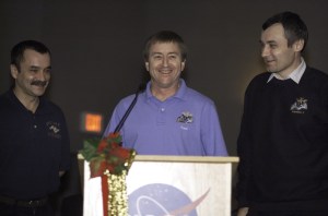 Astronaut Frank L. Culbertson, Jr., Expedition Three mission commander, flanked by cosmonauts Mikhail Tyurin (left) and Vladimir N. Dezhurov, both flight engineers, speak from the lectern in the ballroom of the Gilruth Center at Johnson Space Center (JSC) during the Expedition Three Welcome Home ceremony. Tyurin and Dezhurov represent Rosaviakosmos.