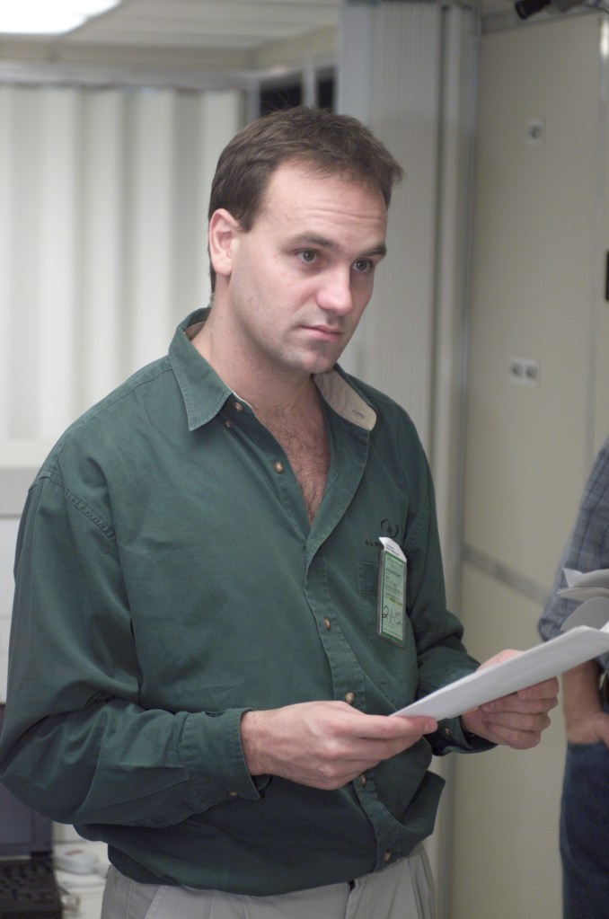 Soyuz 4 Flight Participant Mark Shuttleworth, a South African businessman flying to the International Space Station (ISS) under a private commercial agreement with the Russian Aviation and Space Agency (Rosaviakosmos), listens to briefing in the Johnson Space Center's Space Station Training Facility (SSTF). The Soyuz 4 prime and backup crews have toured several other JSC facilities this week, with yet others scheduled. The prime crew members will launch in late April from the Baikonur Cosmodrome, Kazakhstan, to deliver a fresh Soyuz spacecraft to the station for use as a lifeboat. After spending about a week aboard the outpost, they will return to Earth aboard the Soyuz.