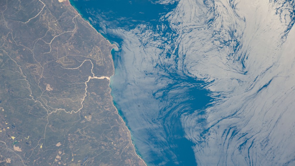 Jupiter River figures prominently entering the Gulf of St. Lawrence from Anticosti Island in the Canadian provice of Quebec in this photograph from the International Space Station as it orbited 264 miles above.