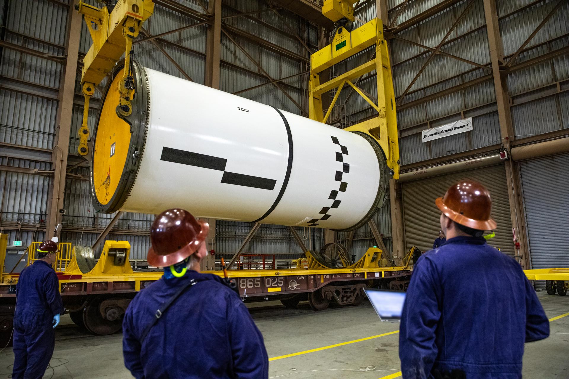 The right forward center segment of the Space Launch System solid rocket boosters is processed.