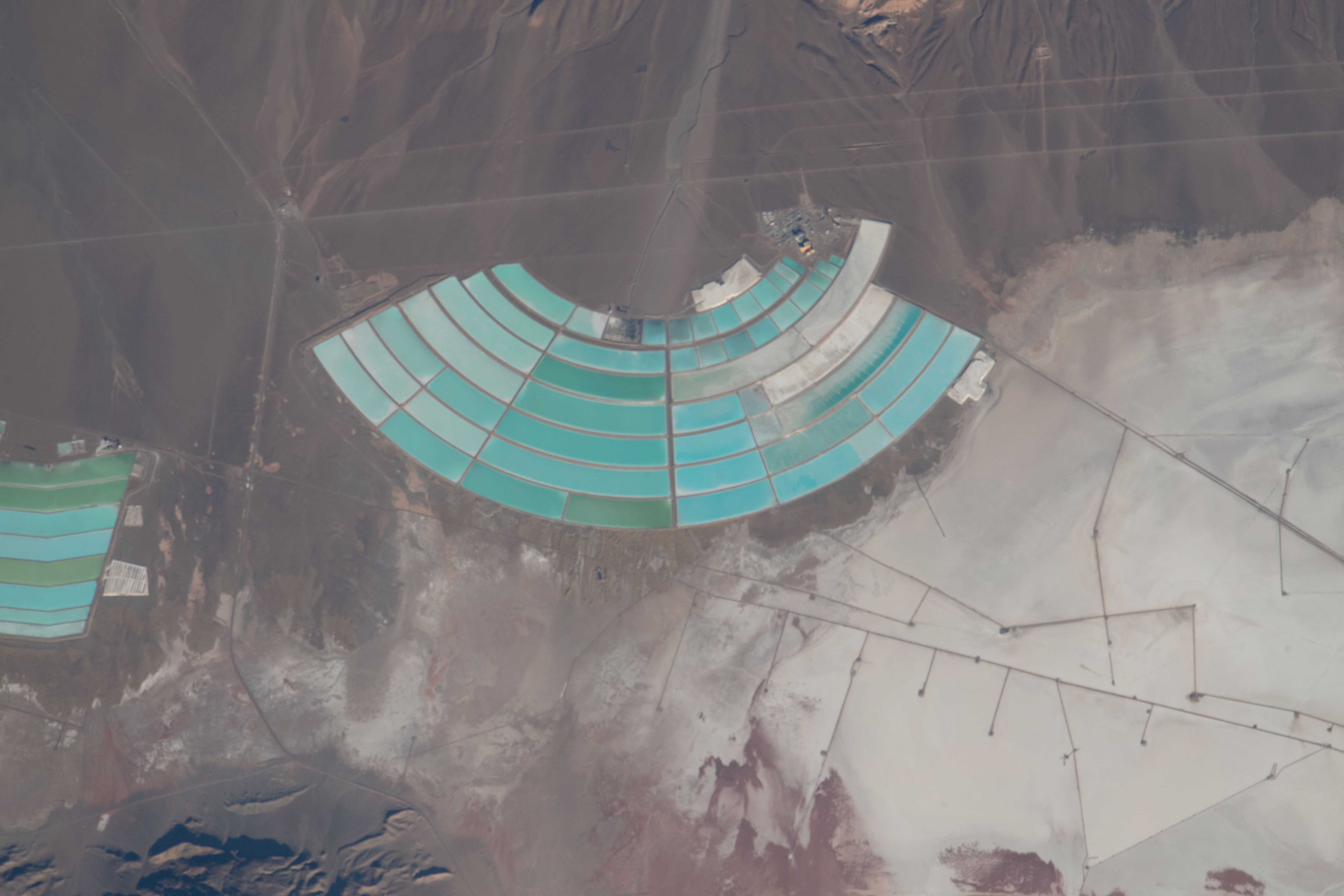 Lithium mining activities are pictured in northern Argentina from the International Space Station as it orbited 266 miles above the South American continent.