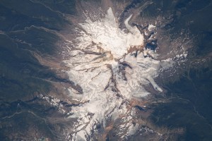 Mount Baker reaches over 10,700 feet of elevation in the state of Washington. The active glacier-covered stratovolcano was seen from the International Space Station as it orbited 265 miles above.