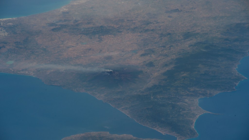 Mount Etna, Europe's tallest active volcano on the coast of Italy's island of Sicily, is pictured billowing with activity as the International Space Station orbited 263 miles above Bulgaria.