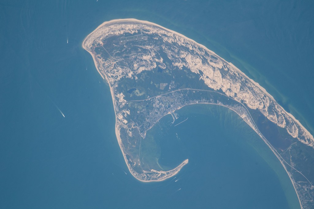 Provincetown, Massachusetts is photographed from the International Space Station as it orbited 261 miles above the coast.