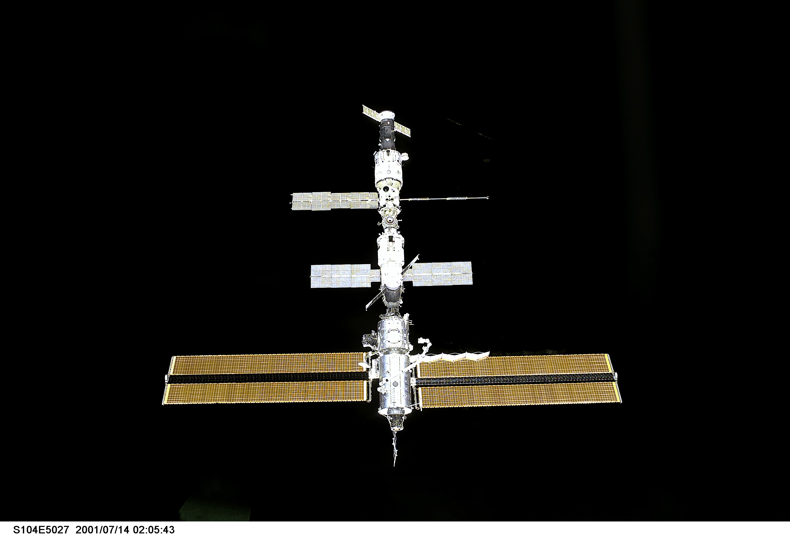 The International Space Station (ISS), with the Expedition Two crew onboard, awaits its rendezvous with the Space Shuttle Atlantis. The picture was...