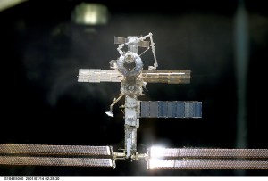 The International Space Station (ISS) almost fills this digital still camera's frame as the Space Shuttle Atlantis closes in for docking.