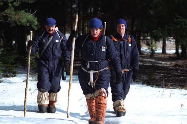 S98-04118 (May 28, 1998) --- Members of the second crew that will live aboard the International Space Station, from left Commander Yuri Usachev from Russia and U.S. astronauts Susan Helms and Jim Voss, participate in Soyuz winter survival training in March 1998 near Star City, Russia. The training prepares the crew in the event the Soyuz spacecraft, used as an emergency crew return "lifeboat" for the station, were to land in a location where the crew could not be immediately reached.