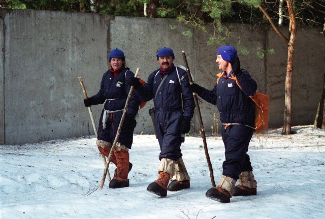 Members of the second crew that will live aboard the International Space Station, from left U.S. astronaut Susan Helms, Commander Yuri Usachev from Russia and U.S. astronaut Jim Voss, participate in Soyuz winter survival training in March 1998 near Star City, Russia. The training prepares the crew in the event the Soyuz spacecraft, used as an emergency crew return "lifeboat" for the station, were to land in a location where the crew could not be immediately reached.