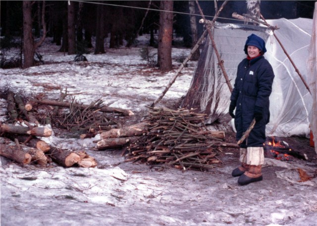 Astronaut Susan Helms, a member of the second crew that will live aboard the International Space Station, gathers firewood during Soyuz winter survival training in March 1998 near Star City, Russia. With Helms on the second station crew are Commander Yuri Usachev of Russia and U.S. astronaut Jim Voss.