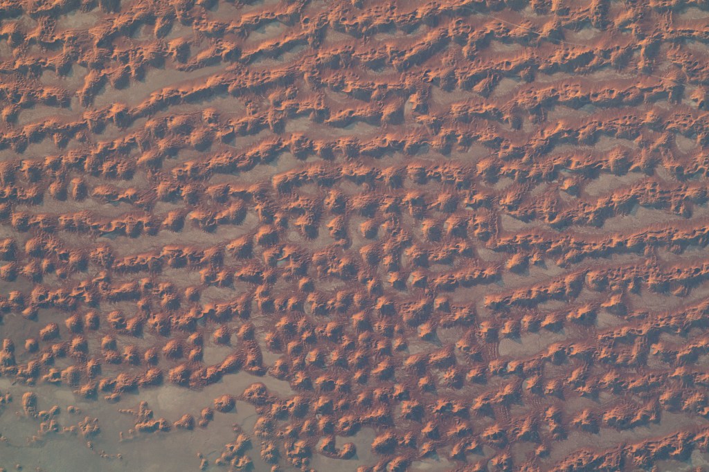 Sand dunes in the desert area along the Saudi Arabia-Oman border were pictured by UAE (United Arab Emirates) astronaut and Expedition 69 Flight Engineer Sultan Alneyadi from the International Space Station as it orbited 256 miles above.