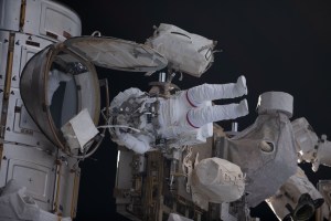 NASA astronaut Stephen Bowen is pictured in his Extravehicular Mobility Unit, or spacesuit, exiting the International Space Station's Quest airlock and beginning a spacewalk. He and UAE (United Arab Emirates) astronaut Sultan Alneyadi (out of frame) would spend seven hours and one minute in the vacuum of space routing cables and installing insulation readying the orbital outpost for its next set of roll-out solar arrays due to be installed after their delivery on the next SpaceX Dragon cargo mission.