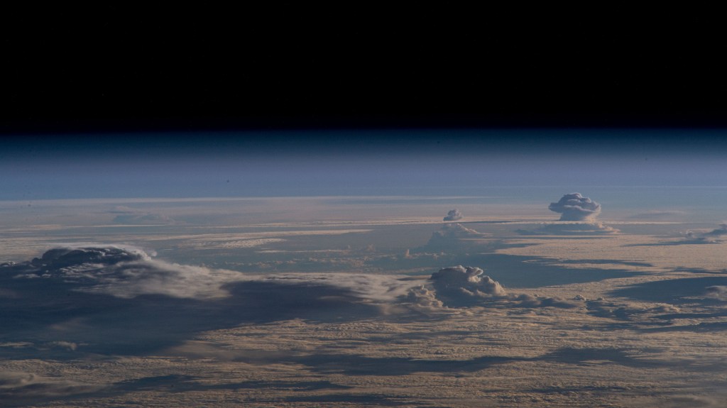 Storm clouds are pictured in this oblique view from the International Space Station as it orbited 261 miles above Australia's Gulf of Carpentaria.