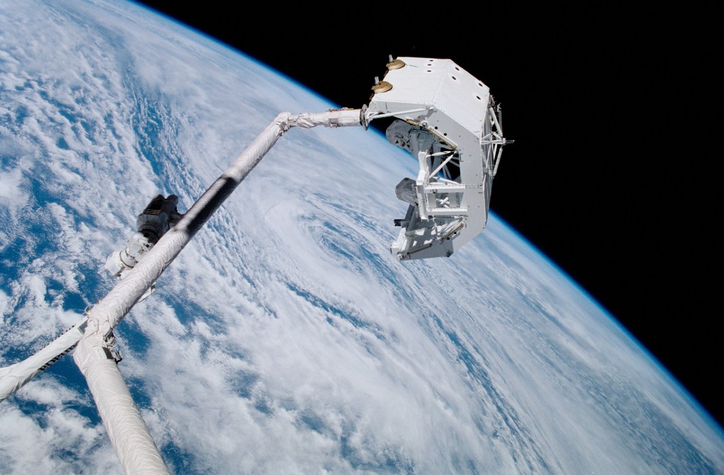 A Canadian "handshake in space" occurred on April 28, 2001 as the Canadian-built space station robotic arm transferred its launch cradle over to Endeavour's Canadian-built robotic arm. A Canadian mission specialist--astronaut Chris A. Hadfield of the Canadian Space Agency (CSA)--was also instrumental in the activity as he was at the controls of the original robot arm from his post on the aft flight deck of the shuttle.