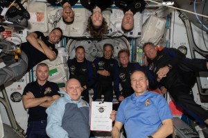 The 11-person crew aboard the station comprises of (clockwise from bottom right) Expedition 67 Commander Tom Marshburn with Flight Engineers Oleg Artemyev, Denis Matveev, Sergey Korsakov, Raja Chari, Kayla Barron, and Matthias Maurer; and Axiom Mission 1 astronauts (center row from left) Mark Pathy, Eytan Stibbe, Larry Conner, and Michael Lopez-Alegria.