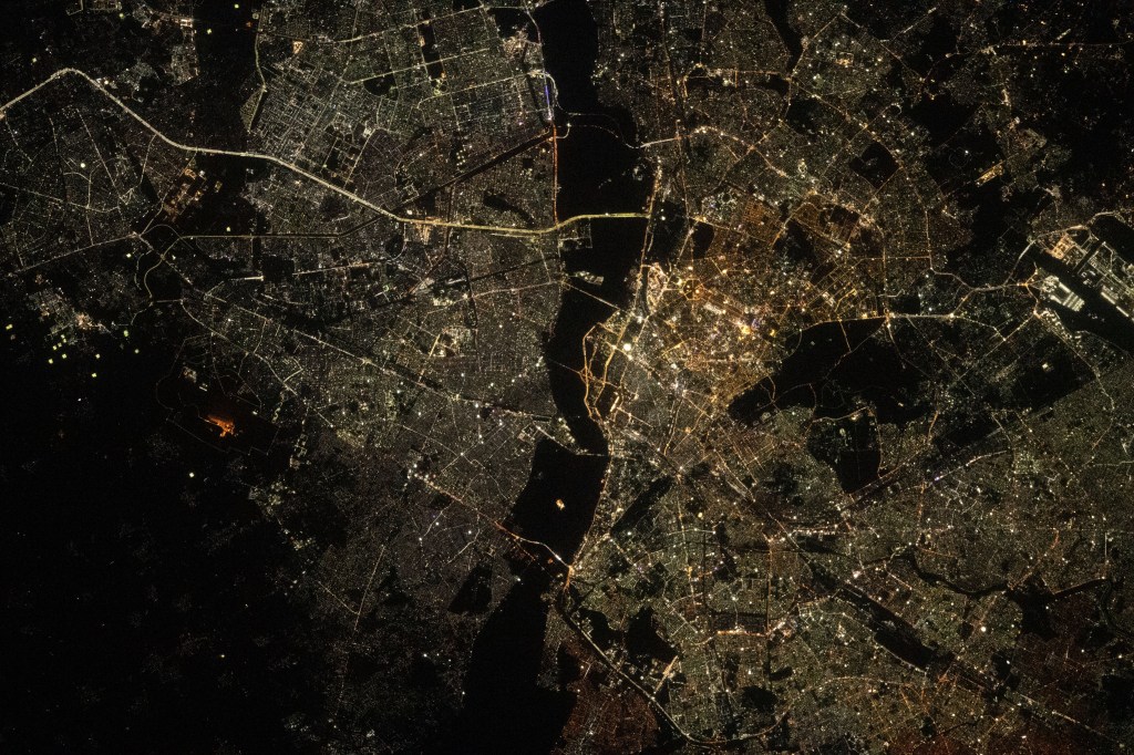 The city lights of New Delhi, India, are split by the darkness of the Yamuna River in this photograph from the International Space Station as it orbited 257 miles above.