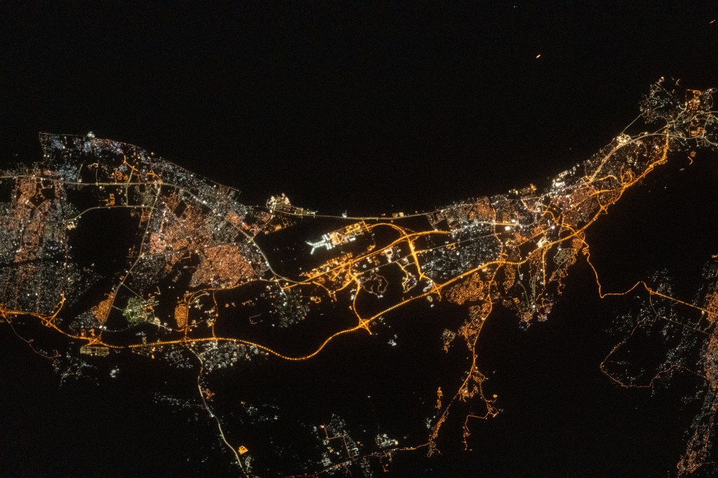 The city lights of the port capital of Muscat, Oman, including the coastal fishing province of Al-Seeb, are pictured from the International Space Station as it orbited 260 miles above the Gulf of Oman. Muscat International Airport is featured prominently in the middle of this photograph.