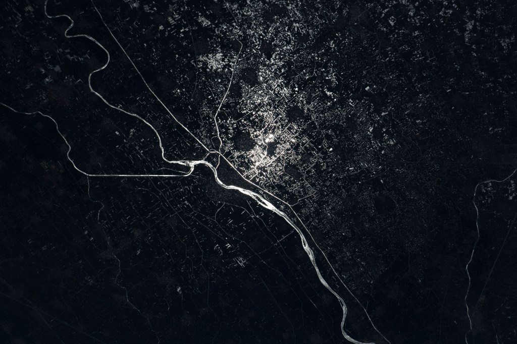 The Damietta Branch of the Nile River splits into canals in the central portion of the Nile Delta in Egypt. Lights from several cities surrounding the Egyptian waterways are pictured in this nighttime photograph from the International Space Station as it orbited 262 miles above the Mediterranean Sea off the coast of the Sinai Peninsula.