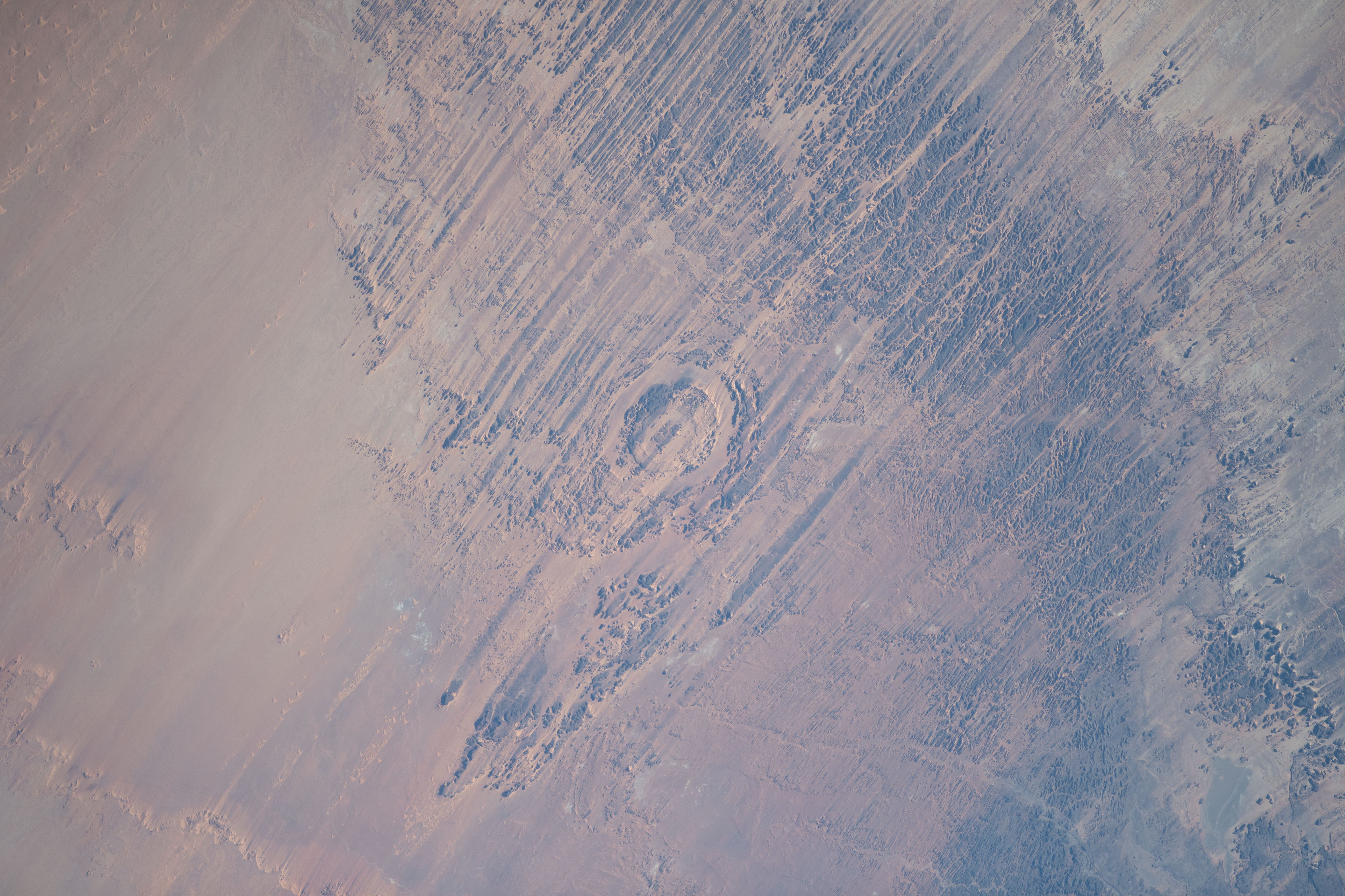 The eroded Aorounga meteorite impact crater, also known as the "Eye of the Desert," in the African nation of Chad is pictured from the International Space Station as it orbited 258 miles above.