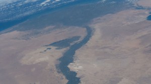 The Faiyum Oasis in Egypt extends to the immediate west of the Nile river which leads to the Mediterranean Sea in this photograph from an external high definition camera on the International Space Station as it orbited 262 miles above.