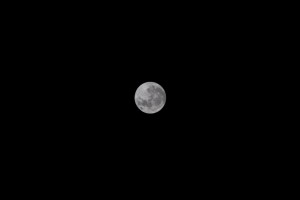A full Moon on the night of Aug. 1— the first of two in the month— as the International Space Station orbited 265 miles above Earth.