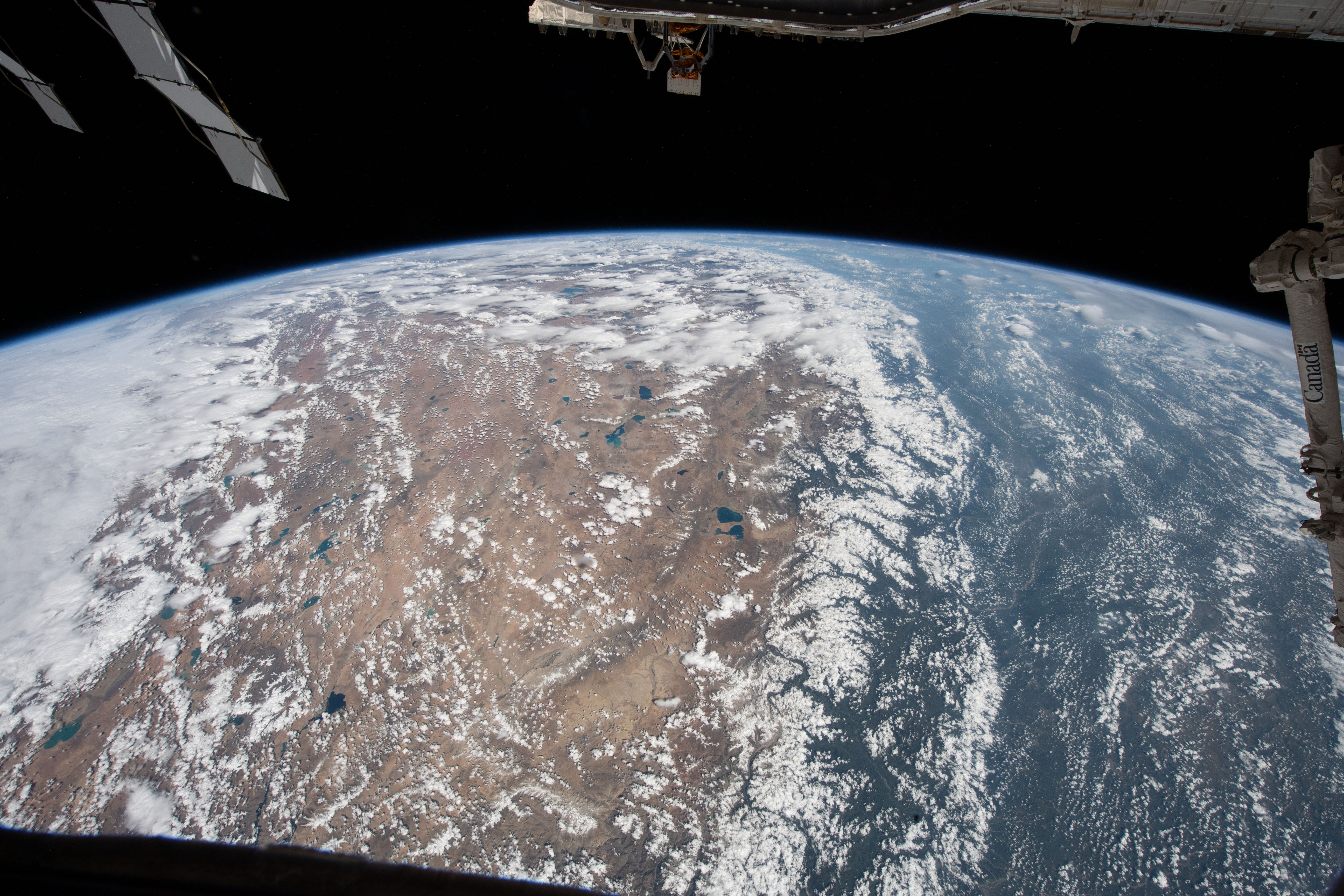 The Himalayas, separating the Indian subcontinent from the Asian continent, are pictured from the International Space Station as it orbited 257 miles above northern India. The Asian mountain range prevents the northern colder air from blowing south allowing the subcontinent's tropical zone to extend farther north than anywhere else in the world.