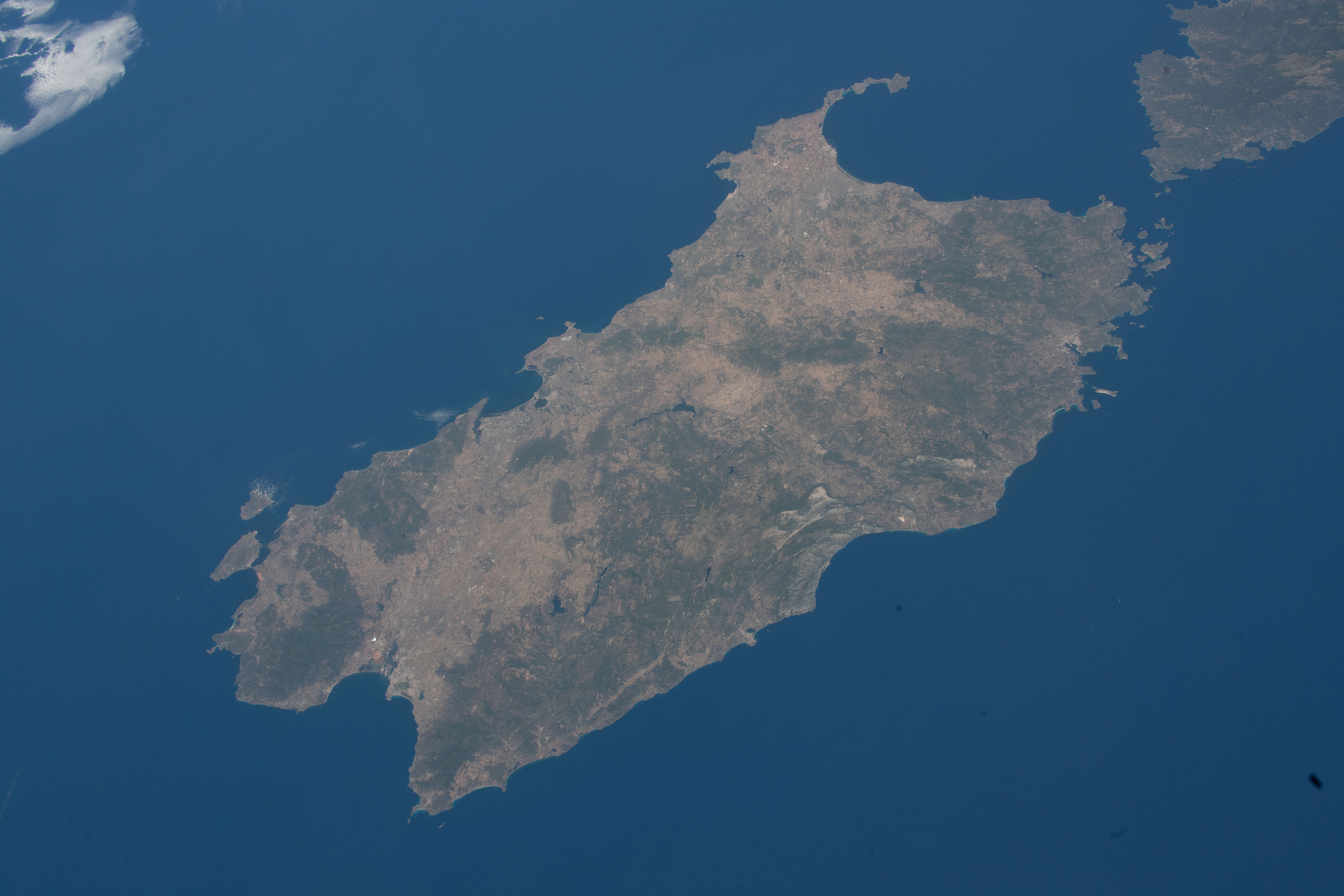 The Italian island of Sardinia and the French island of Corse (upper right) are pictured from the International Space Station as it orbited 263 miles above the Tyrrhenian Sea off the coast of Naples, Italy.