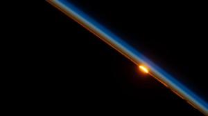 The last rays of an orbital sunset dim in the Earth's atmosphere as the International Space Station orbited above Niger on the African continent.