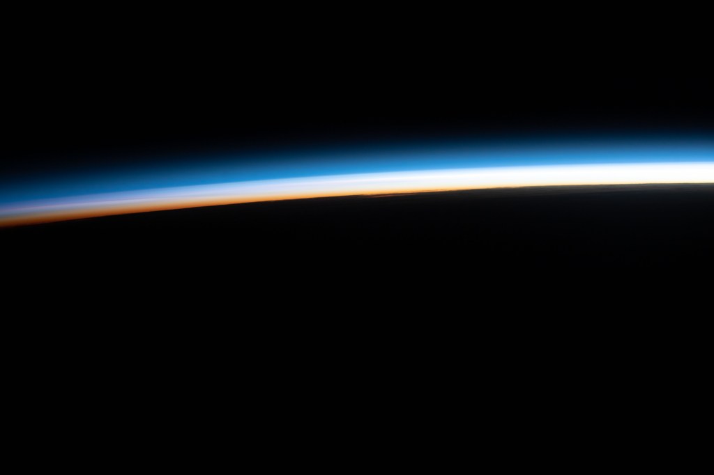 The last rays of an orbital sunset illuminate Earth's horizon in this photograph from the International Space Station as it orbited 267 miles above the Indian Ocean off the coast of Madagascar.
